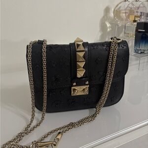 Rare Valentino Glam Lock Floral in black.